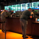 People line up to make sports bets at the Borgata casino in Atlantic City, N.J., March 19, 2021.